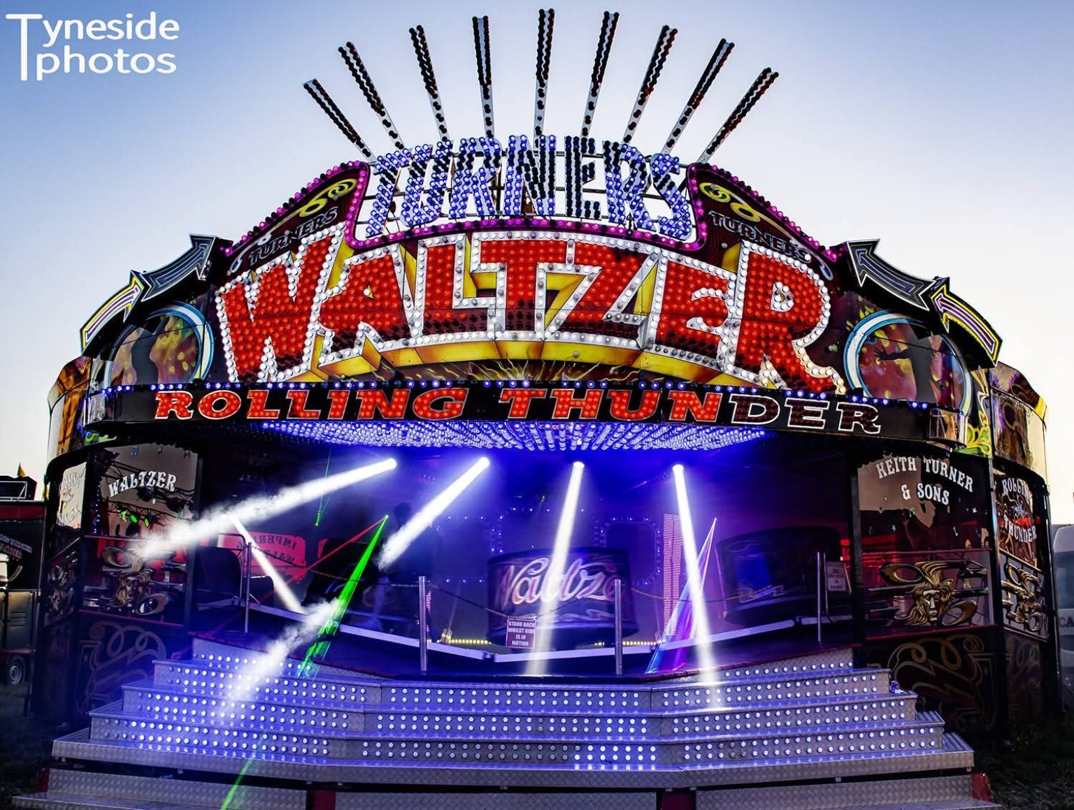 Turner's Waltzer lit for the evening